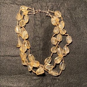 Choker necklace with clear beads with yellow tint